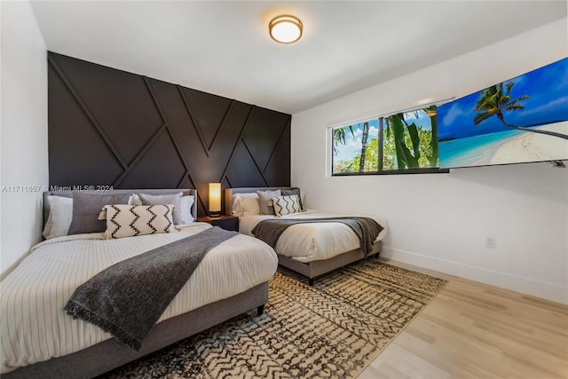 bedroom featuring hardwood / wood-style floors