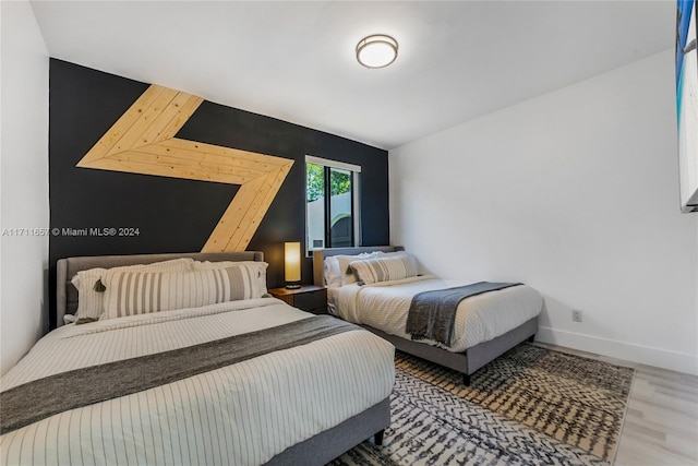 bedroom featuring hardwood / wood-style flooring