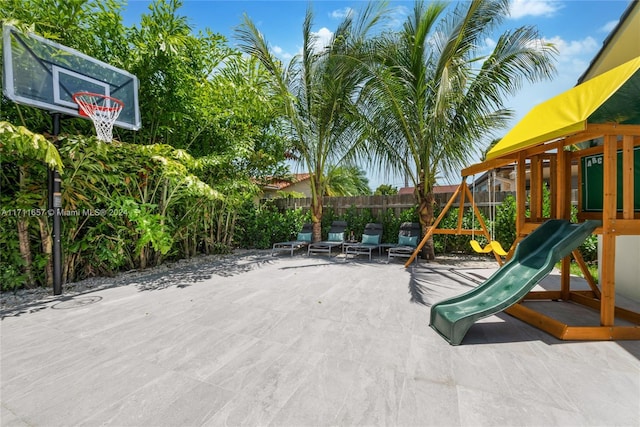 view of patio with a playground