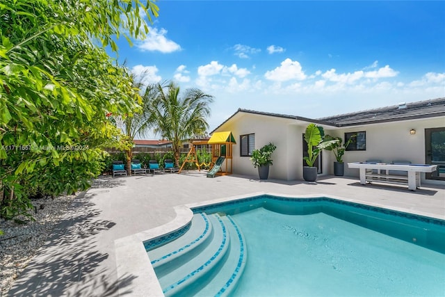 view of pool featuring a patio