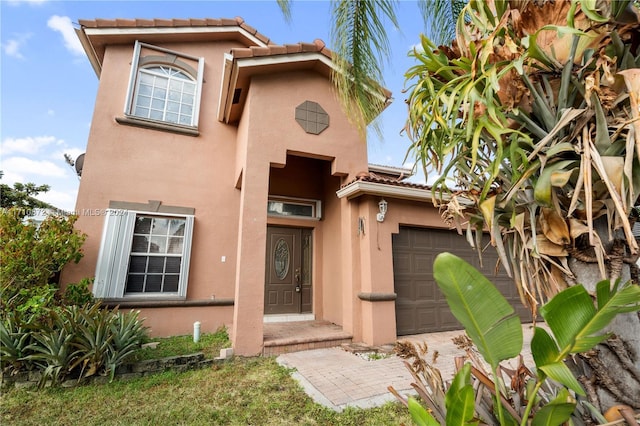 view of front of house with a garage