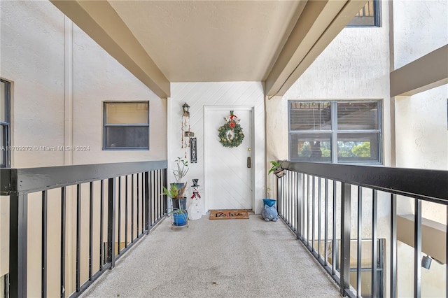 entrance to property featuring a balcony