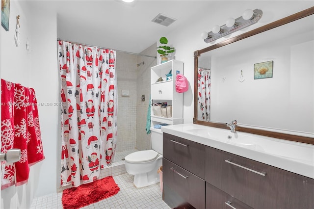 bathroom featuring vanity, tile patterned flooring, a shower with shower curtain, and toilet