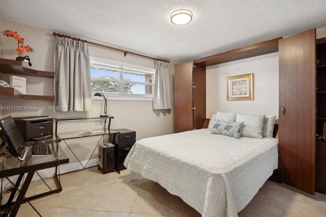 bedroom with a textured ceiling