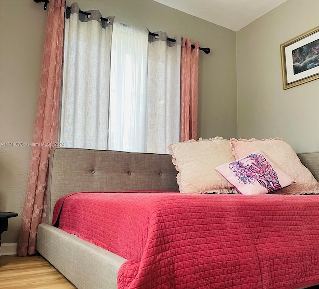 bedroom featuring light wood-type flooring