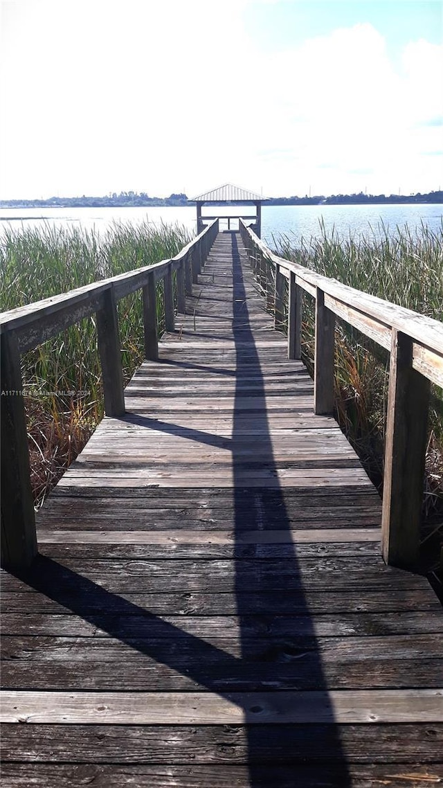 view of dock with a water view