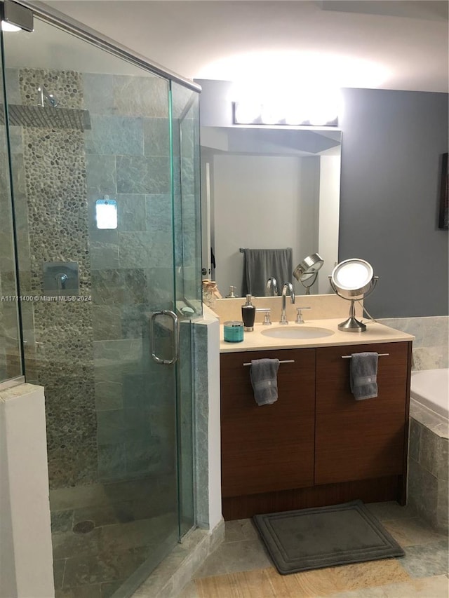 bathroom with vanity and walk in shower