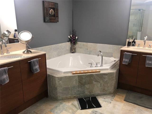 bathroom with vanity and plus walk in shower