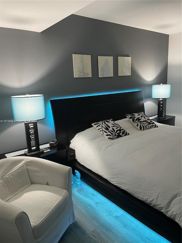 bedroom featuring hardwood / wood-style flooring