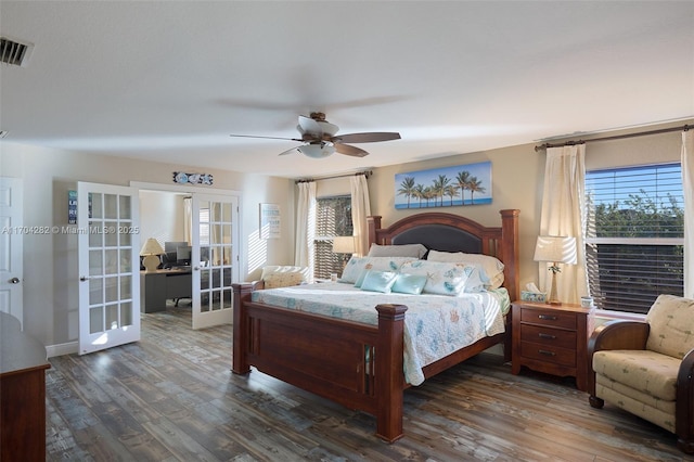 bedroom featuring dark hardwood / wood-style floors, french doors, and ceiling fan