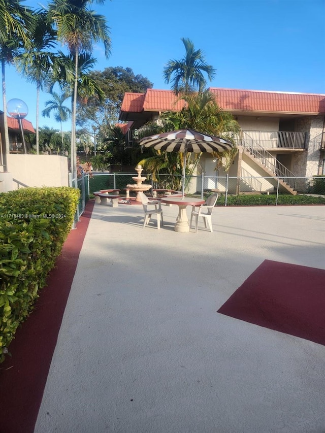 surrounding community featuring a patio area