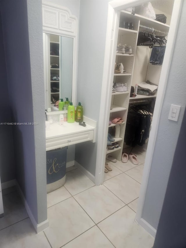 bathroom with tile patterned flooring