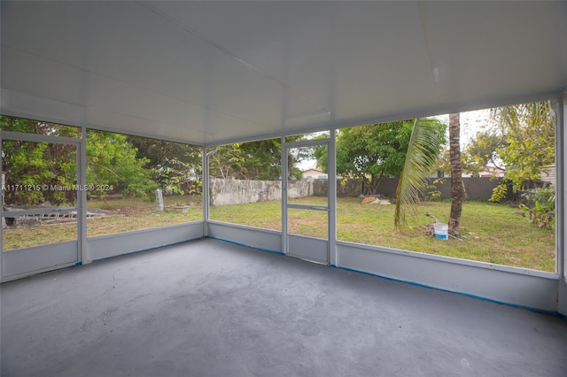 unfurnished sunroom featuring a wealth of natural light