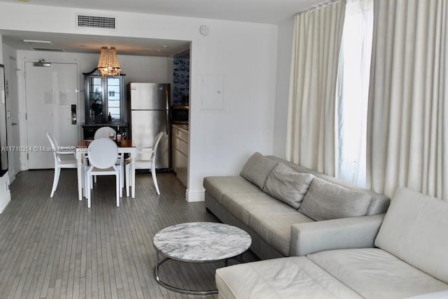 living room with wood-type flooring