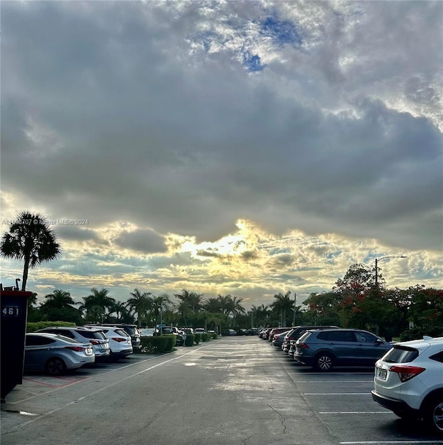 view of parking at dusk