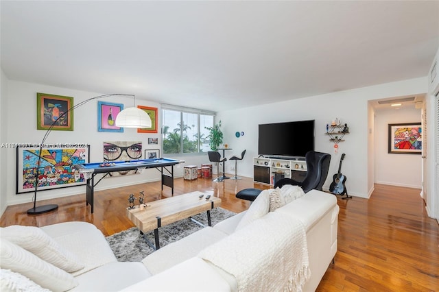 living room with hardwood / wood-style flooring