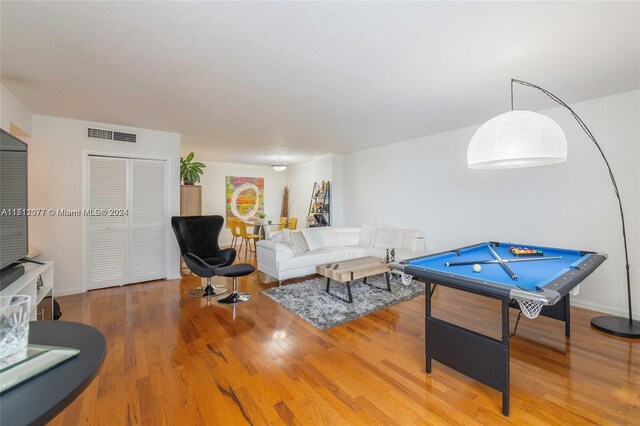 game room featuring wood-type flooring and pool table