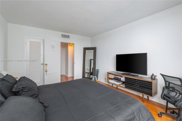 bedroom featuring hardwood / wood-style flooring