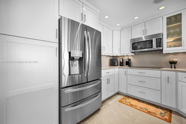 kitchen with white cabinets and stainless steel appliances