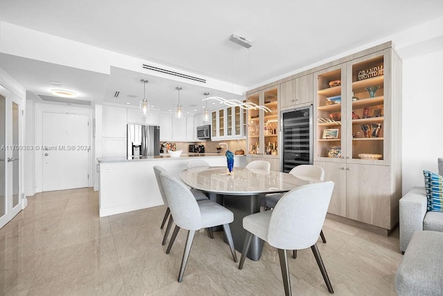 dining area featuring wine cooler