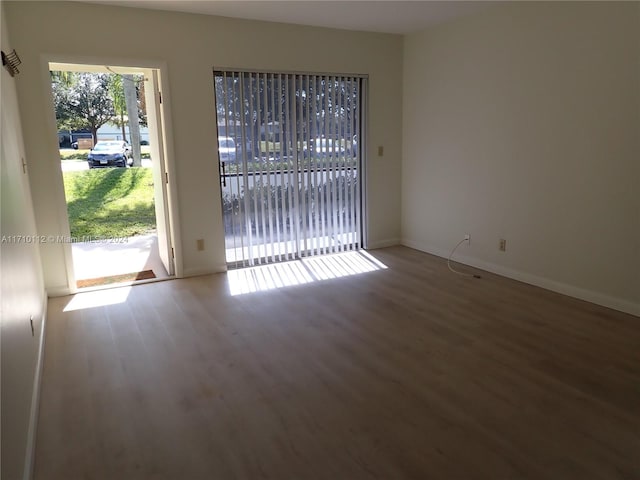 spare room featuring hardwood / wood-style flooring