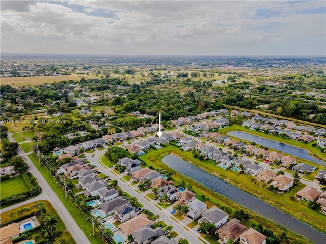 drone / aerial view featuring a water view