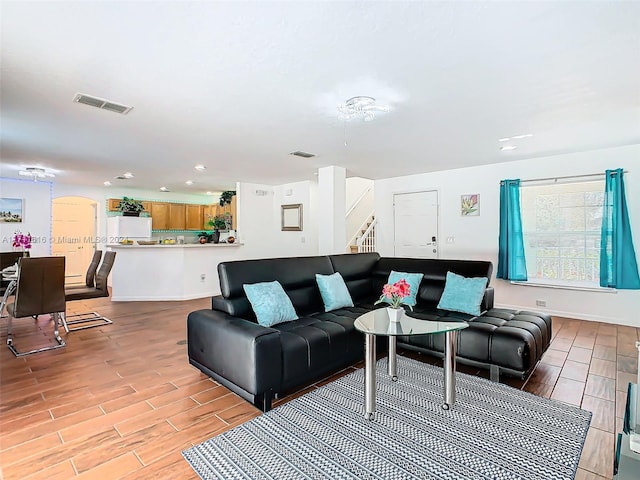 living room with light hardwood / wood-style floors