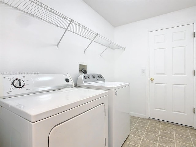 laundry room featuring washer and clothes dryer