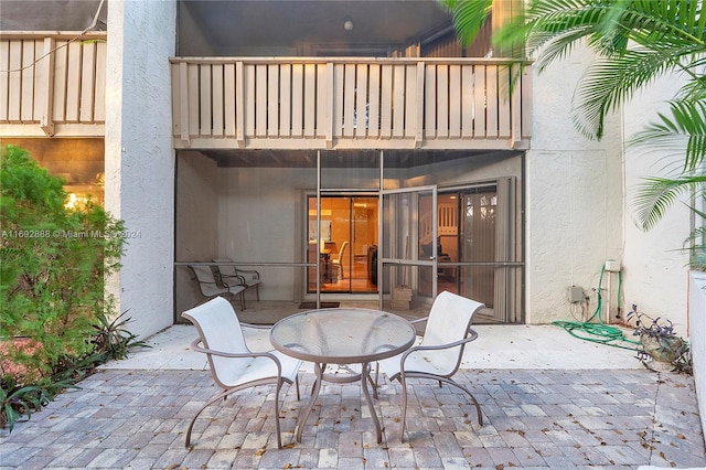 view of patio / terrace with a balcony