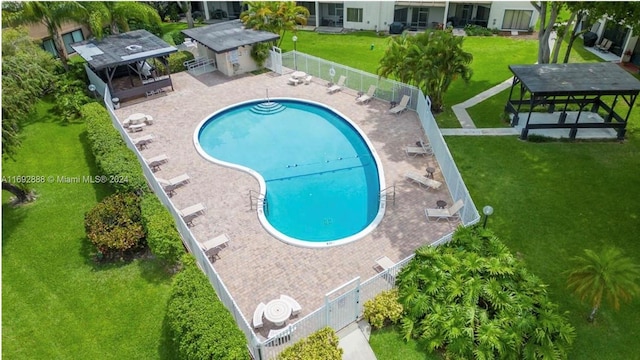 view of swimming pool with a patio area