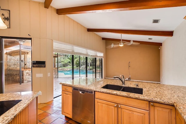 kitchen with light stone countertops, sink, light tile patterned floors, lofted ceiling with beams, and dishwasher