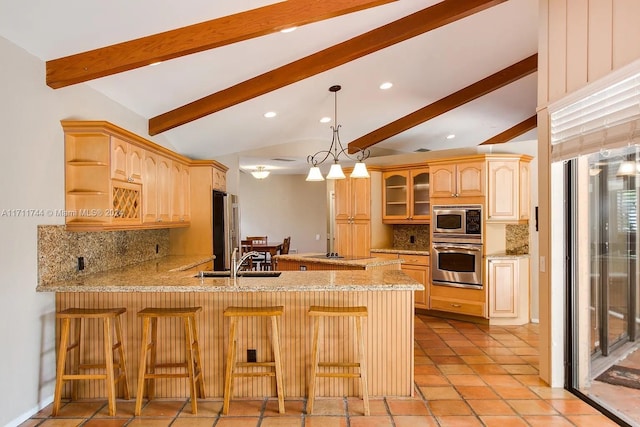 kitchen featuring decorative backsplash, lofted ceiling with beams, kitchen peninsula, and appliances with stainless steel finishes