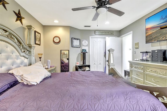 bedroom with ceiling fan and a closet