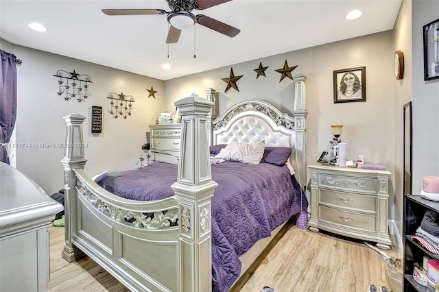 bedroom featuring ceiling fan and light hardwood / wood-style floors