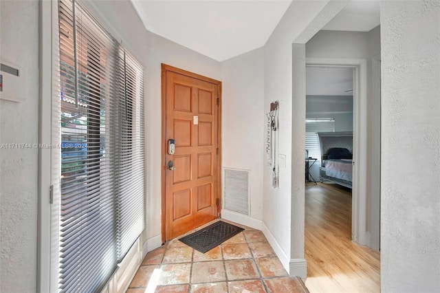 entrance foyer featuring light hardwood / wood-style floors