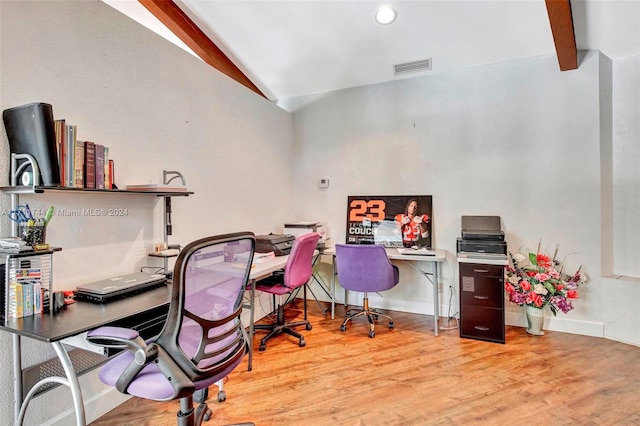 office area featuring lofted ceiling with beams and light hardwood / wood-style floors