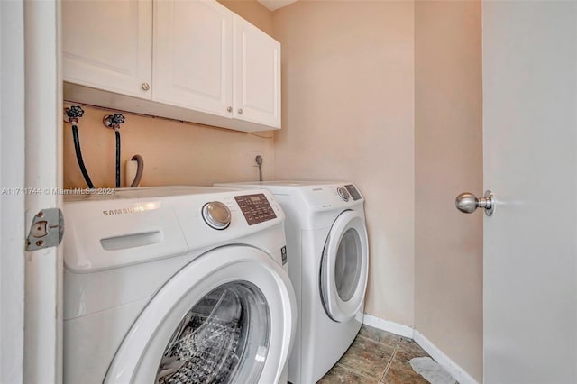 laundry area featuring cabinets and independent washer and dryer