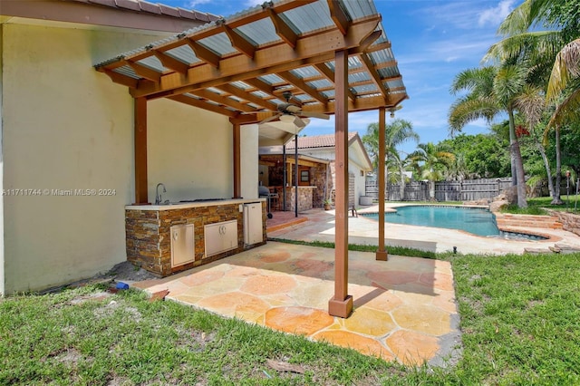 view of swimming pool with a patio, a pergola, area for grilling, and ceiling fan