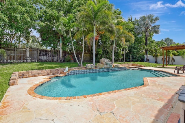 view of pool featuring a lawn and a patio area