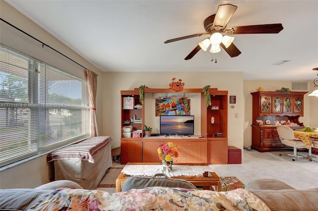 living room featuring ceiling fan