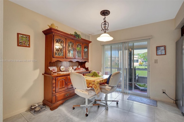 dining area with light tile patterned floors