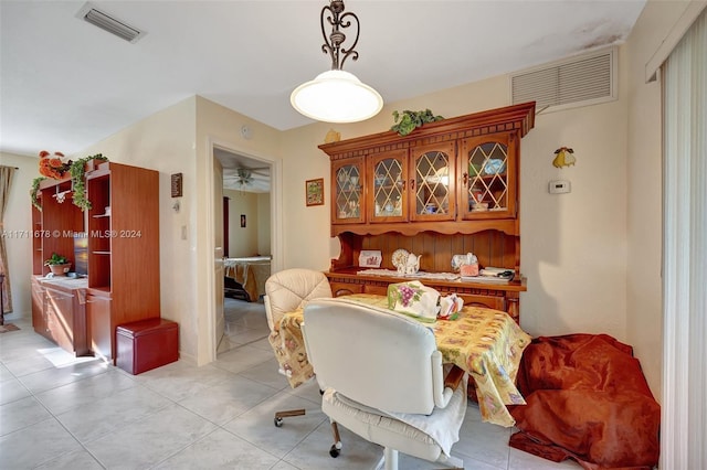 dining space with light tile patterned floors