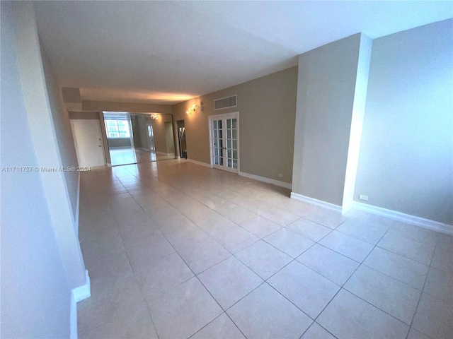 view of tiled spare room