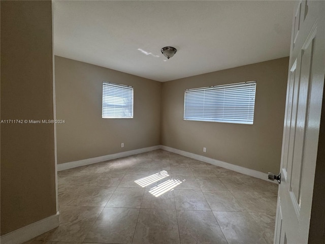 view of tiled empty room