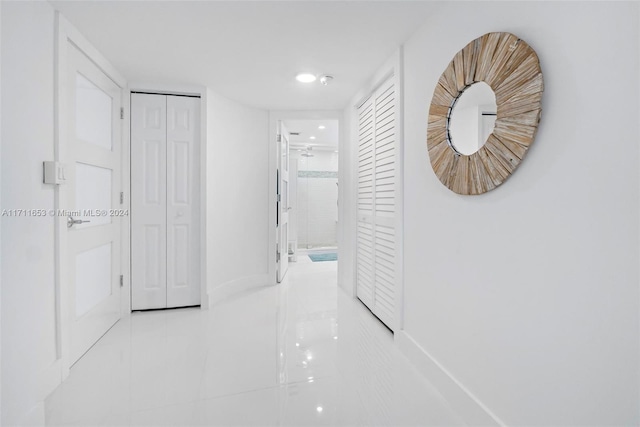 corridor featuring tile patterned flooring