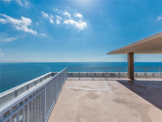 view of patio / terrace with a water view