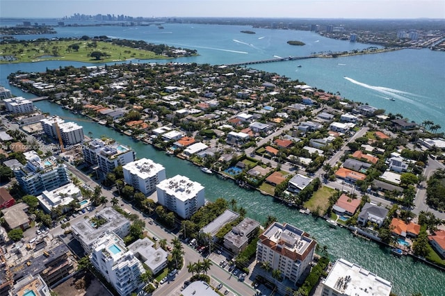 bird's eye view with a city view and a water view