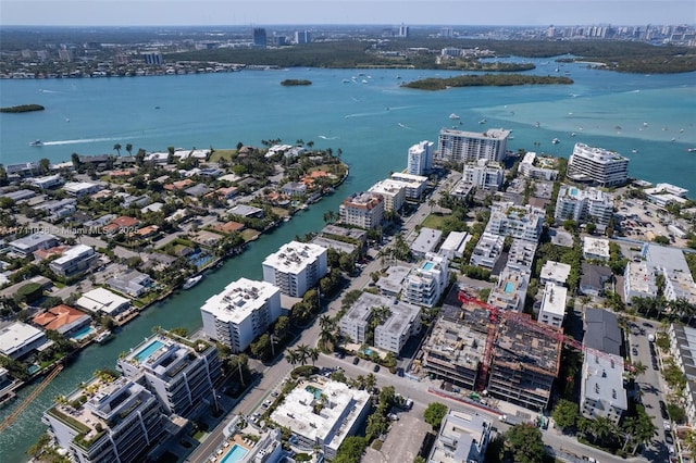 aerial view with a water view and a view of city