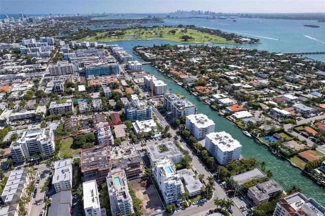 aerial view featuring a water view and a view of city