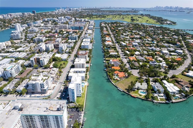 bird's eye view with a water view and a view of city